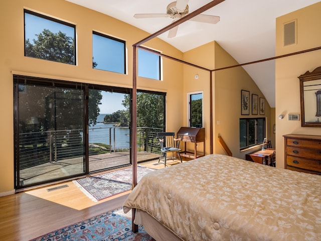 48 Andrews Rd, Guilford, CT 06437 - bedroom with access to outside, wood finished floors, a water view, and vaulted ceiling