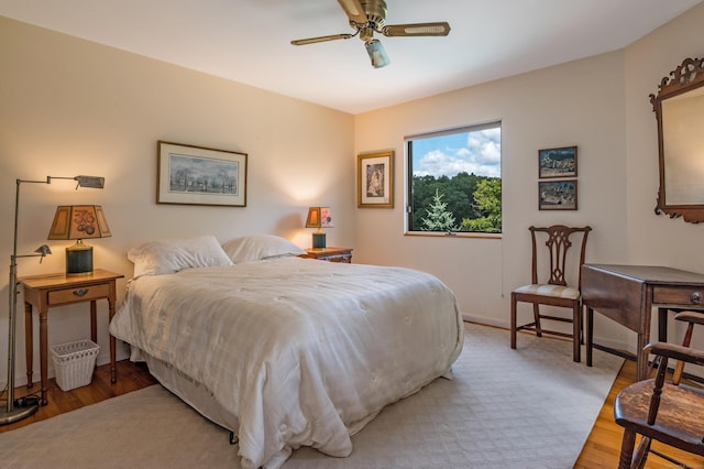 48 Andrews Rd, Guilford, CT 06437 - bedroom with wood finished floors, a ceiling fan, and baseboards
