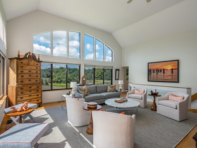 48 Andrews Rd, Guilford, CT 06437 - living room with wood finished floors, high vaulted ceiling, and a ceiling fan