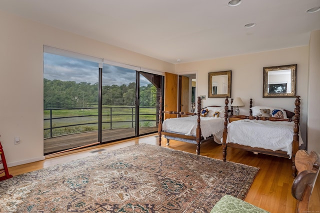 48 Andrews Rd, Guilford, CT 06437 - bedroom featuring access to outside, wood finished floors, and recessed lighting