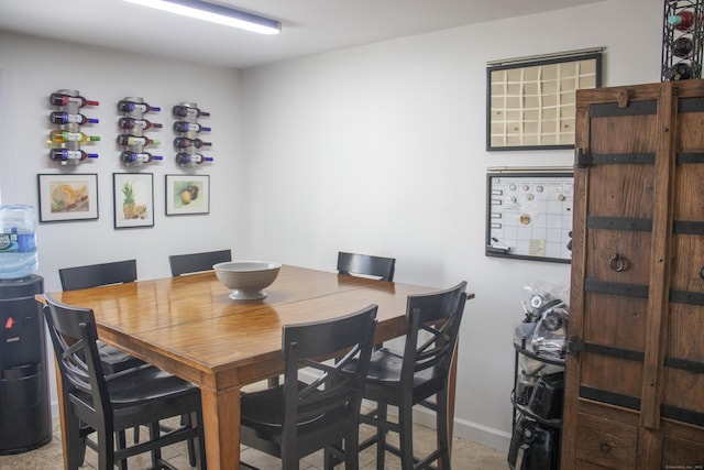 dining room with baseboards