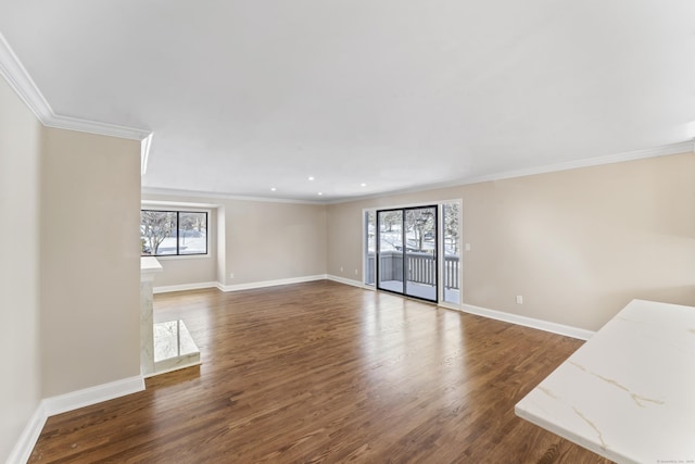 unfurnished living room featuring baseboards, crown molding, wood finished floors, and recessed lighting