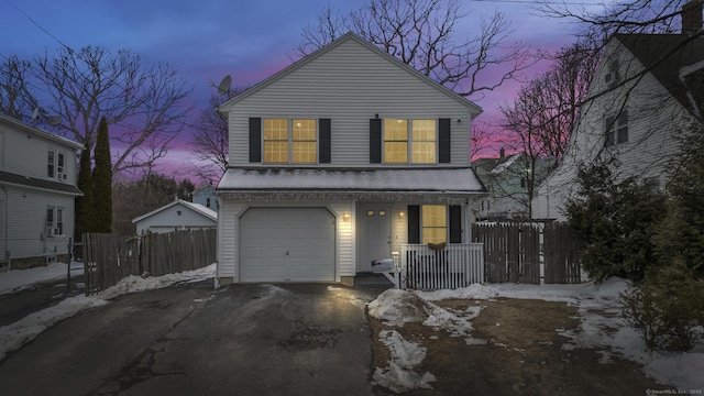 view of front property with a garage