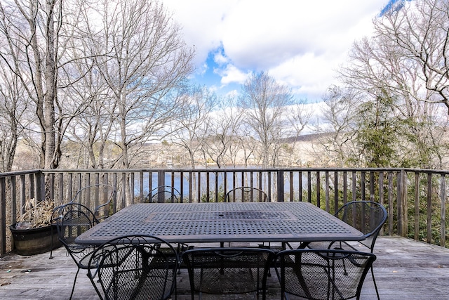 wooden deck with outdoor dining area