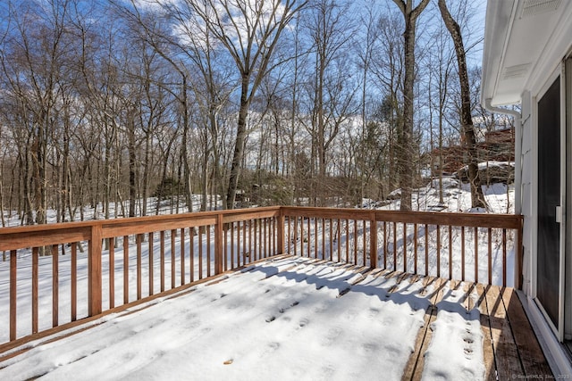 view of snow covered deck