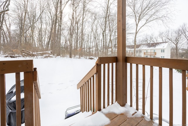 view of snow covered deck