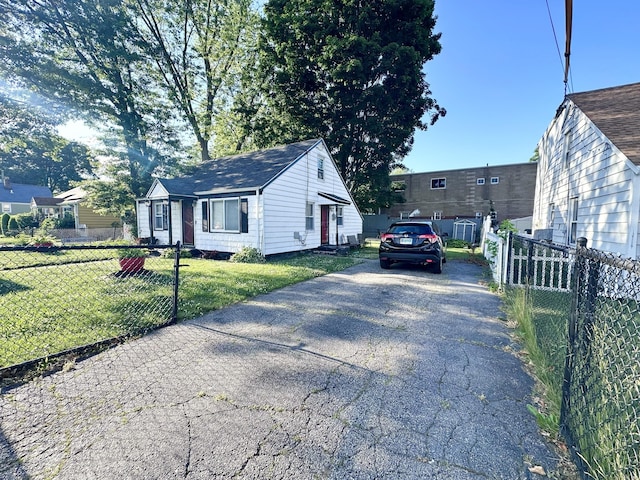 view of property exterior featuring a yard