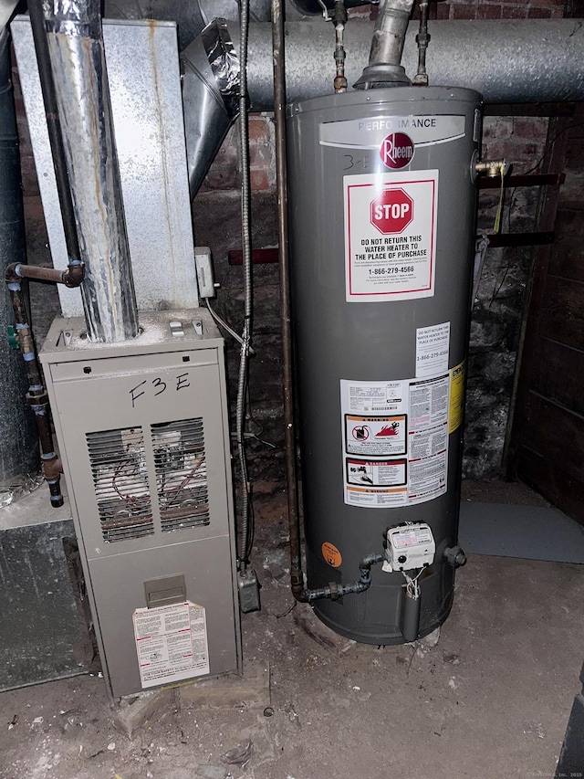 utility room with water heater and heating unit