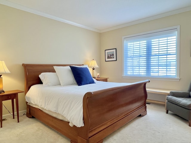 bedroom featuring light carpet and crown molding