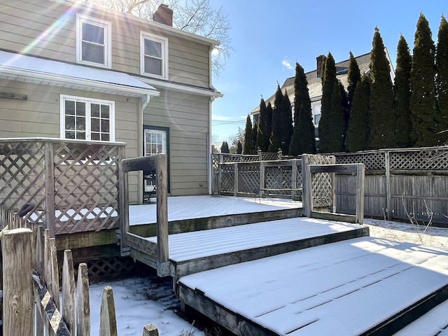 view of snow covered deck