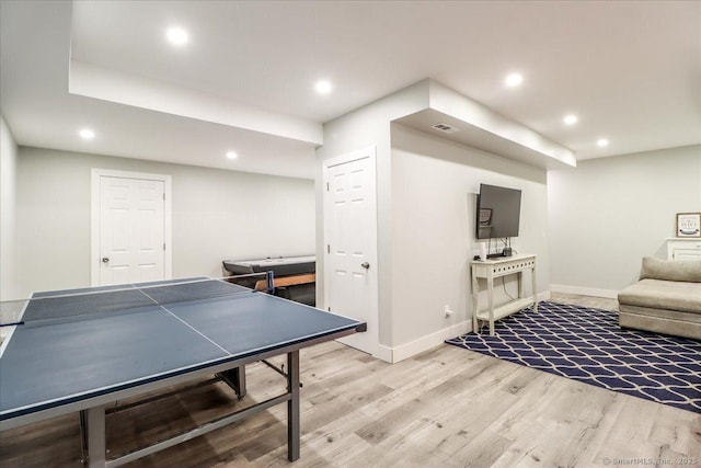 playroom featuring light wood-type flooring