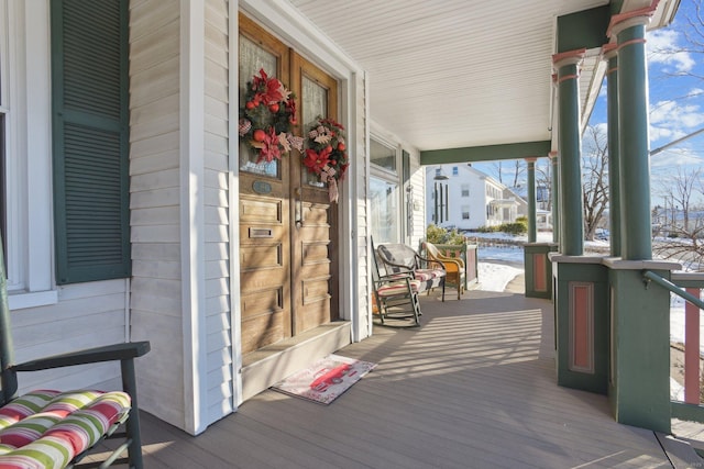 deck featuring covered porch