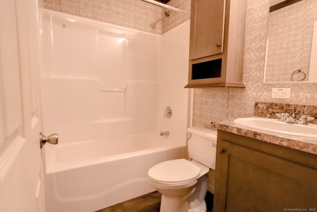 bathroom with shower / bathtub combination, tasteful backsplash, vanity, and toilet