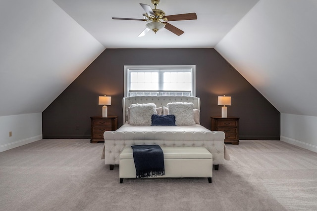 carpeted bedroom featuring ceiling fan, baseboards, and vaulted ceiling