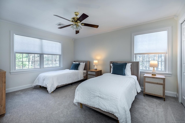 bedroom with carpet floors, baseboards, visible vents, and ornamental molding