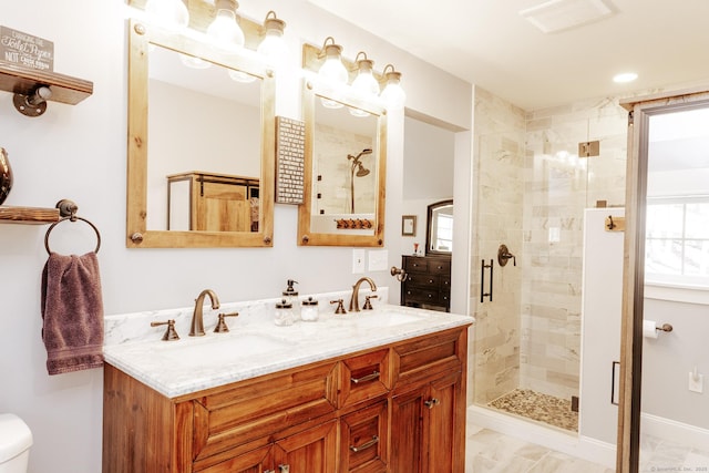 bathroom with vanity and walk in shower