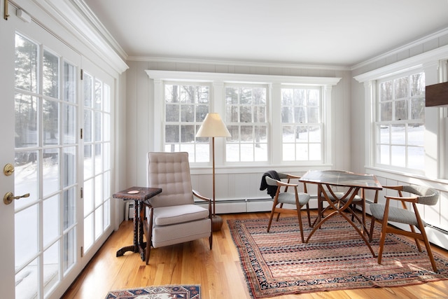 sunroom / solarium featuring breakfast area