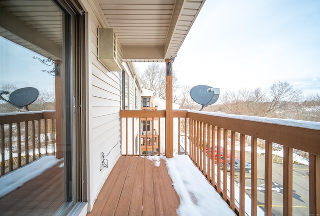 view of snow covered deck