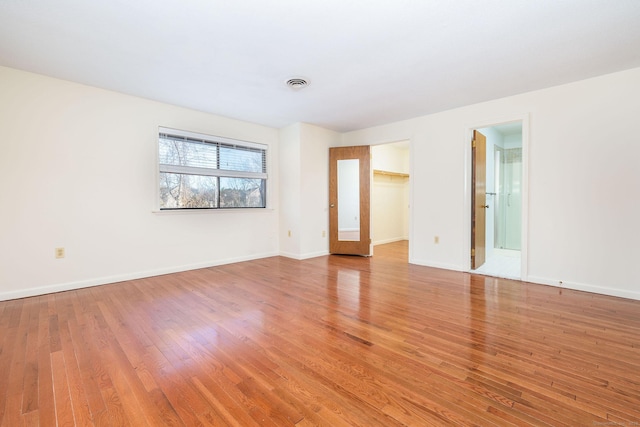 empty room featuring light hardwood / wood-style floors