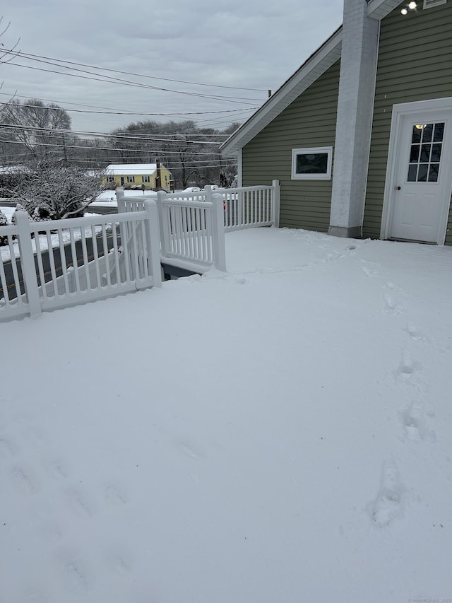 view of snow covered deck