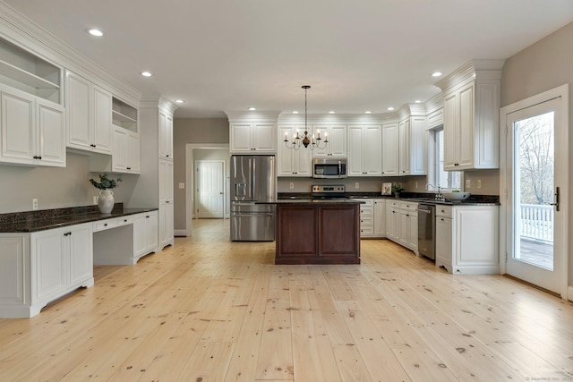 kitchen featuring open shelves, stainless steel appliances, white cabinets, a notable chandelier, and light wood-type flooring