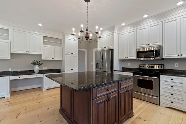 kitchen with open shelves, stainless steel appliances, white cabinets, light wood-style floors, and a notable chandelier