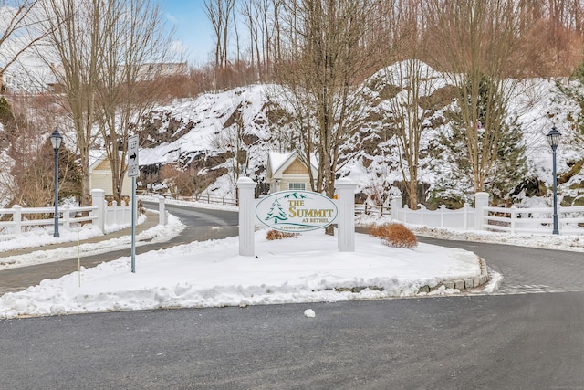 view of property's community with fence