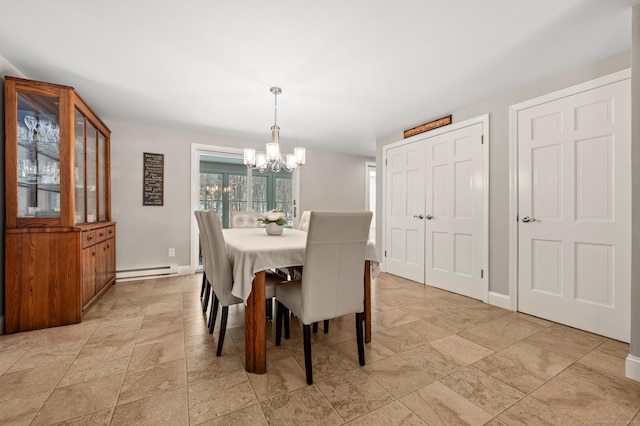 dining room with a baseboard radiator and a notable chandelier