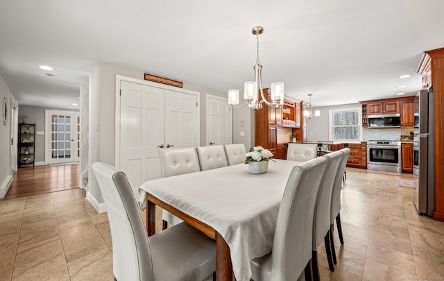 dining room with a chandelier