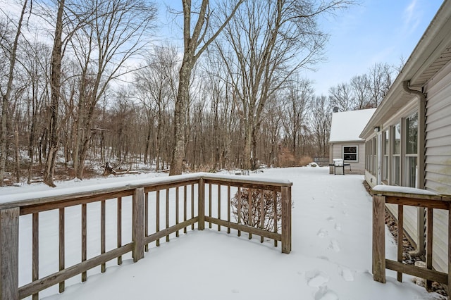 view of snow covered deck