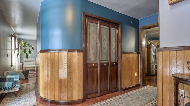 49 Quinebaug Ave, Putnam, CT 06260 - hall with wainscoting, wood finished floors, and wooden walls
