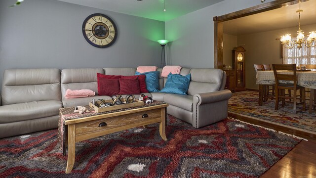49 Quinebaug Ave, Putnam, CT 06260 - living area featuring a chandelier and wood finished floors