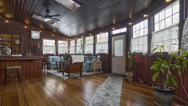 49 Quinebaug Ave, Putnam, CT 06260 - sunroom / solarium featuring lofted ceiling, a deck, wood walls, hardwood / wood-style flooring, and wooden ceiling