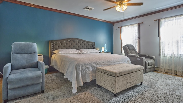 49 Quinebaug Ave, Putnam, CT 06260 - bedroom with ornamental molding, a ceiling fan, and wood finished floors
