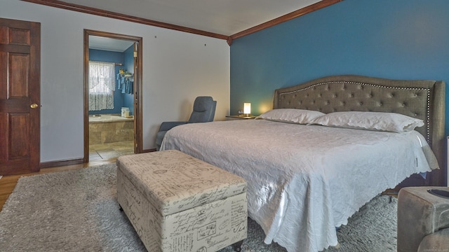 49 Quinebaug Ave, Putnam, CT 06260 - bedroom with ornamental molding, baseboards, wood finished floors, and ensuite bathroom