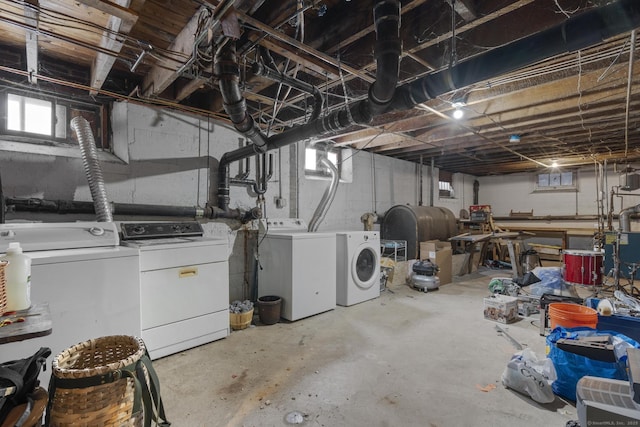 basement with washer and clothes dryer