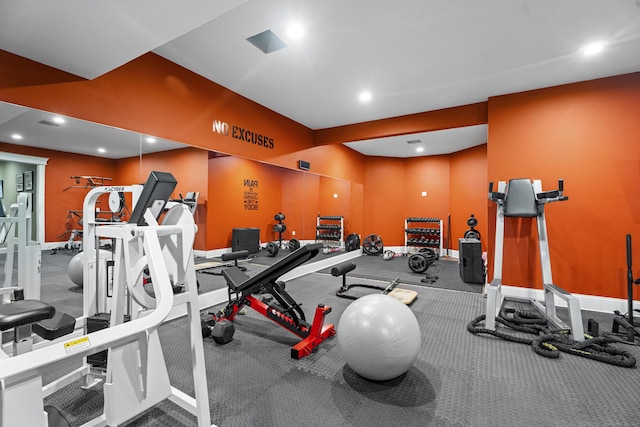 exercise room featuring recessed lighting and baseboards