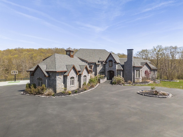 131 Burr Hill Rd, Killingworth, CT 06419 - french country inspired facade with a chimney and stone siding