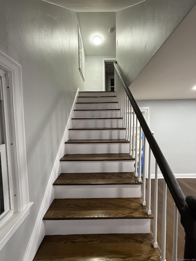 stairway with baseboards