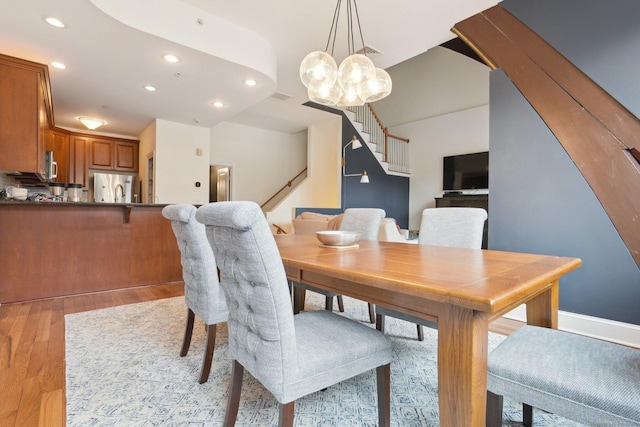 dining area with light wood-type flooring