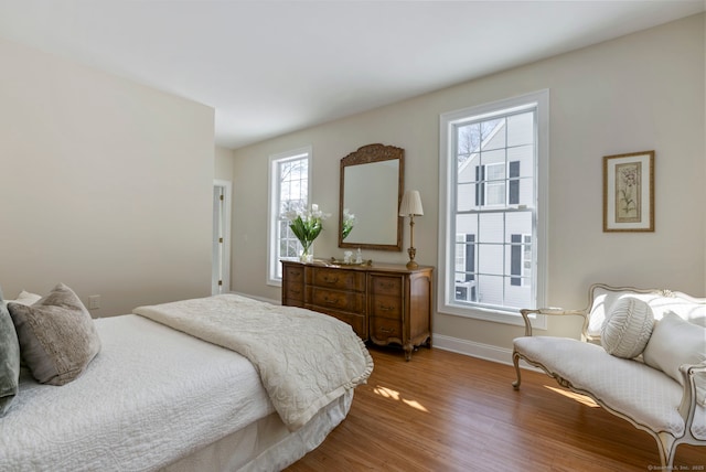 bedroom featuring light wood-type flooring