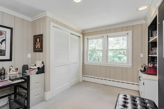 office space with a baseboard heating unit, light carpet, and crown molding