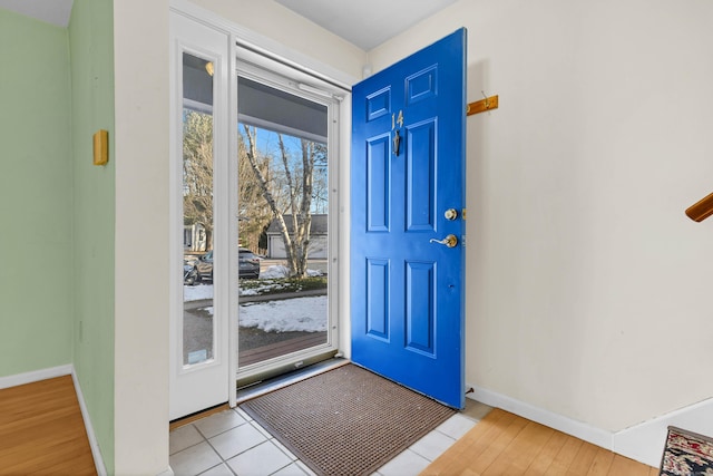 entrance foyer with light tile patterned floors