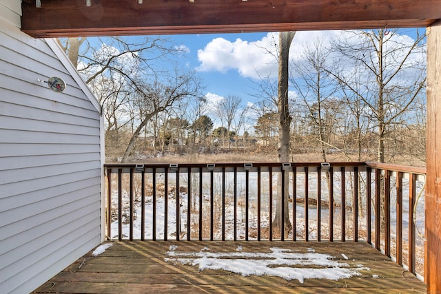 view of snow covered deck