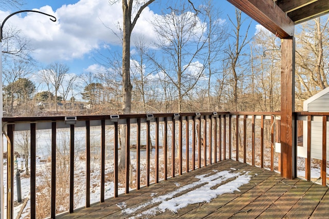 view of snow covered deck