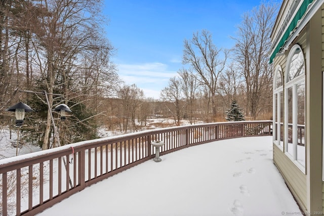 view of snow covered deck