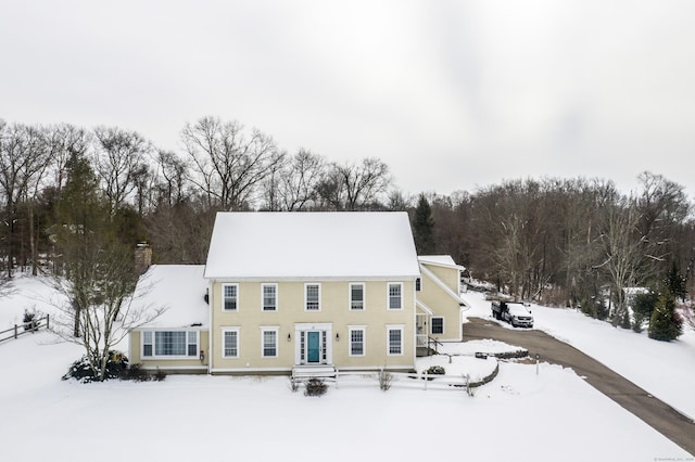 view of snow covered property