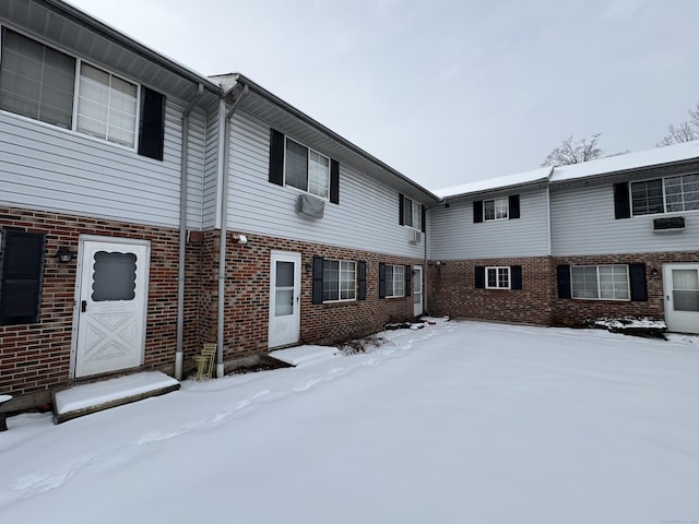 view of snow covered property