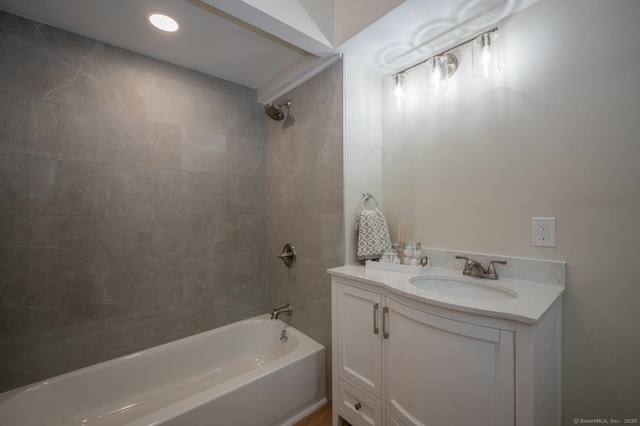 full bath featuring vanity and shower / bath combination