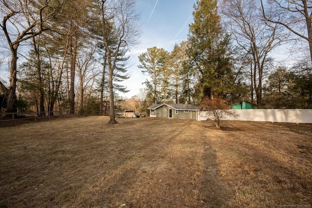 view of yard featuring fence